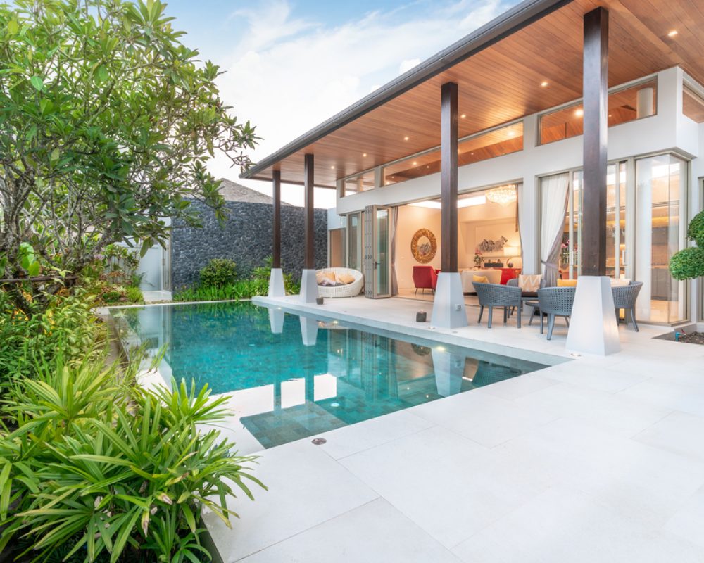 home or house Exterior design showing tropical pool villa with greenery garden,